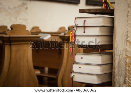 Close up of book stack in old church