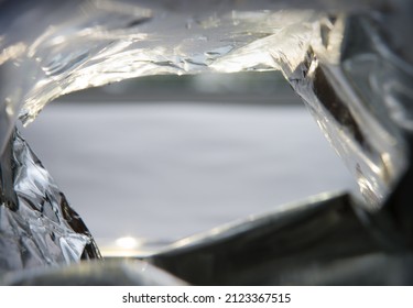 Close up bottom upward detail macro big large blank light gold plastic cold protect wrap tinfoil text space. Retro market shop sale small pouch sack golden fried tasty salty sweet spicy idea design - Shutterstock ID 2123367515