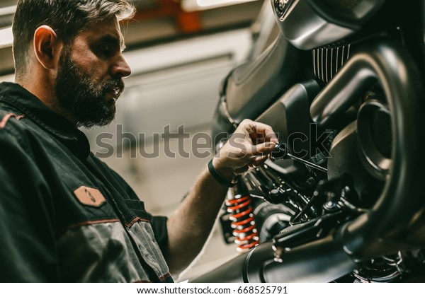 Handsome Motorcycle Mechanic Stock 