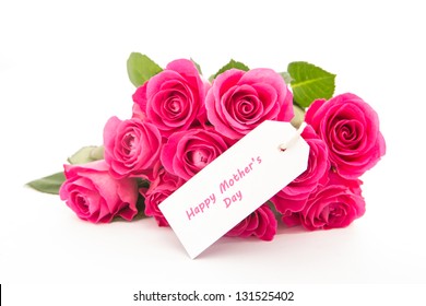 Close Up Of A Bouquet Of Pink Roses With A Happy Mothers Day Card On A White Background