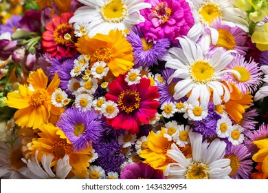 Close Up Of Bouquet Of Various Summer Flowers As Background