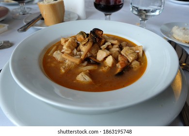 Close Up Bowl Of Arroz Caldoso, Spanish Rice Soup With Chicken And Seafood