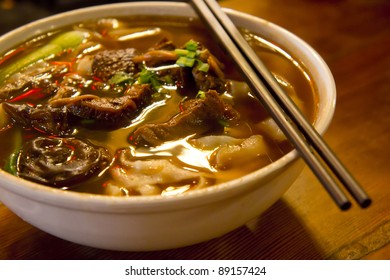 Close Up Of A Bowl Of Chinese Style Beef Noodle Soup.