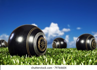 Close up of  bowling balls on an open bowling field