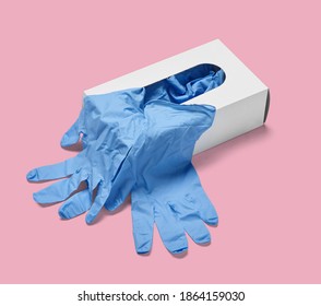 Close Up Of A Box Of White Latex Protective Gloves On White Background