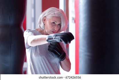 Close up of boxing elderly lady - Powered by Shutterstock