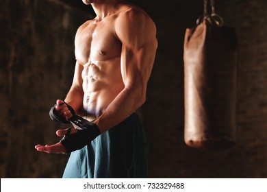 Close up of a boy's muscles after finishing the workout and notice sculpted abdominal and pectoral abdomen. Concept of: supplements, power, workout, workout - Powered by Shutterstock