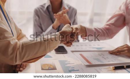 Close up brainstorming of asian businesswoman, bookkeeping, industrial sector of government partnership company, colleague working together to check audit, balance sheet to prevent fraud and bribery