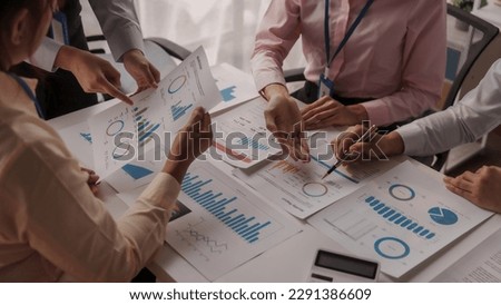 Close up brainstorming of asian businesswoman, bookkeeping, industrial sector of government partnership company, colleague working together to check audit, balance sheet to prevent fraud and bribery