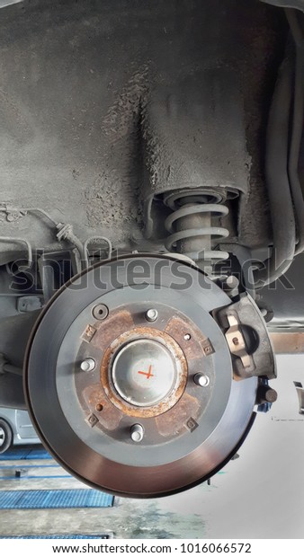 Close up of brake compartment of a car under\
repairing in a service\
shop