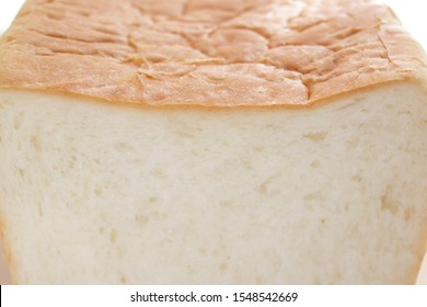Close up of bread on white background with copy space