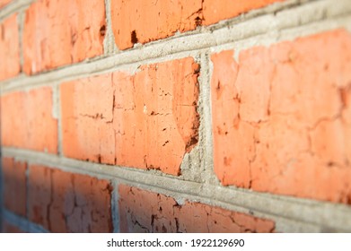 Close Brick Wall With Mortar Joints On The Background