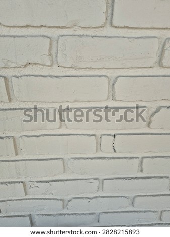 Close up of brick wall painted white