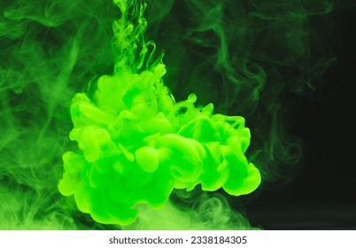 Close up of bright green ink in water with copy space on black background. Ink, liquid, shape and colour concept. - Shutterstock ID 2338184305