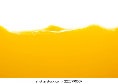 Cerrar la textura de jugo de naranja brillante para la salud y las olas naturales