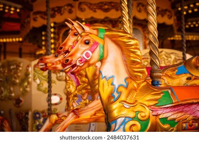 Close up of brightly painted ponies on carousel amusement park ride.  - Powered by Shutterstock