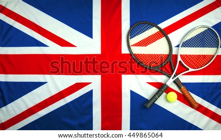 Close up of a British flag with tennis rackets and a ball. Can be used to celebrate Wimbledon and Andy Murray, a British player, winning the men's finals.