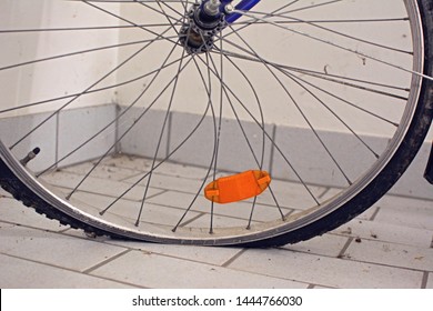 Close Up Of A Broken Bicycle Wheel Bent And Twisted Spokes And Flat Tired