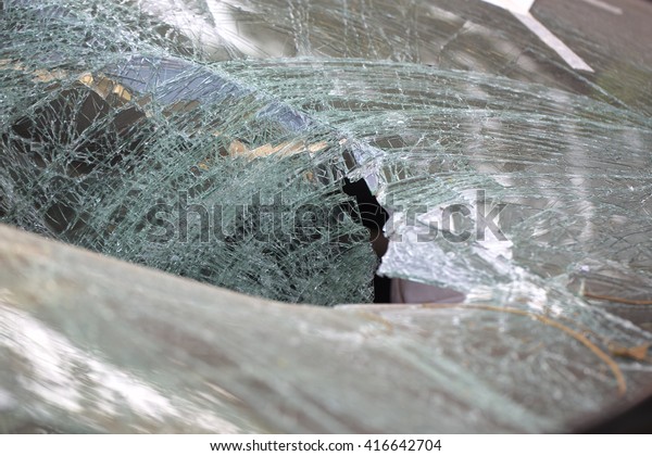 Close Up of a Broken Car\
Windshield 