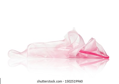 Close up broken condom and reflect of condom isolated on white background. The signs of sexually transmitted disease.