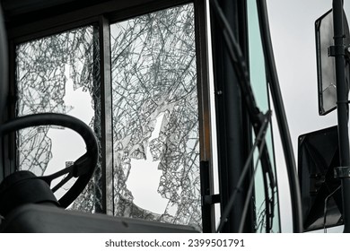 close up of broken school bus windows 