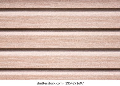 Close Up Of Brown Vinyl Siding