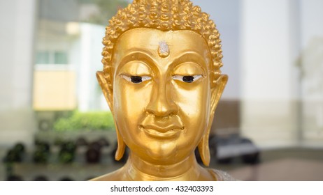Close up of Buddha face.