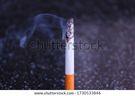 close up of a burnig cigarette