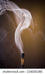 Close Up Of A Burnt Matchstick Smoldering