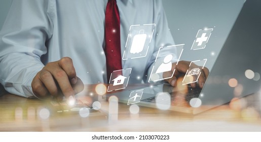 Close up business man calculate expense monthly with banking life insurance home loan travelling credit card annual savings money heath care costs growth up chart. Financial and spending payment. - Shutterstock ID 2103070223