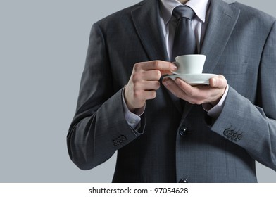 close up business man with coffee cup - Powered by Shutterstock