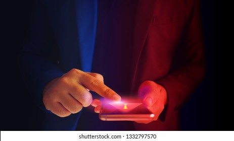 Close Up Business Man Formal Blue Suit Use Hold Smart Phone In The Dark. Warning Smart Phone Security. Virus Alert.