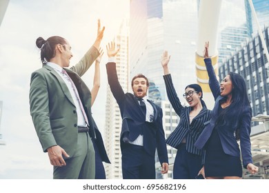 Close up of business people hands together. Teamwork concept.  - Shutterstock ID 695682196