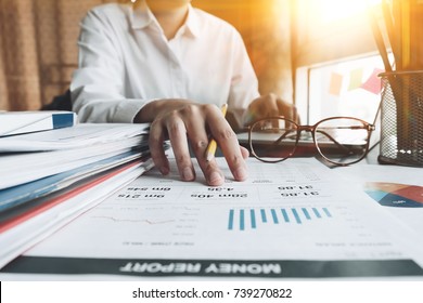 Close Up Of Business Woman Investment Consultant Analysis Company Annual Financial Report Balance Sheet Statement Working With Documents Graphs. Business Concept