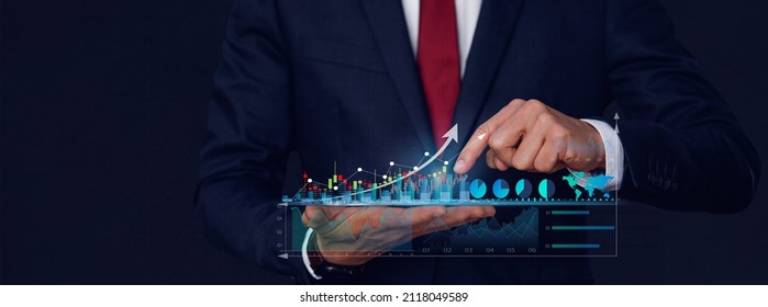 Close up of Businessman draw graph growth of business amid the global economic crisis, Strategy and planning, Recovery of business, Analyzing and data exchange on global networking. 
Close up of Busin - Powered by Shutterstock