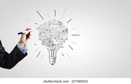 Close up of businessman hand drawing business strategy sketches - Powered by Shutterstock - Get 15% off with code: PIKWIZARD15
