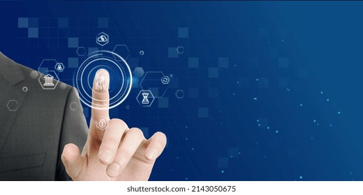Close up of businessman hand pointing at abstract glowing id fingerprint web protection and security interface on blurry blue bokeh background with mock up place. Identification, cybersecurity and pri