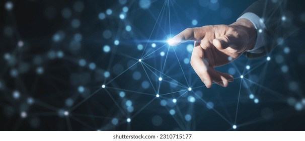 Close up of businessman hand pointing at creative glowing blurry plexus on dark background. Digital communication and network concept