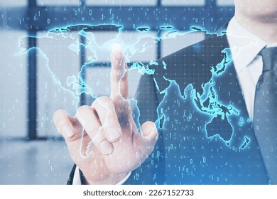 Close up of businessman hand pointing at glowing binary code map hologram on blurry office interior background. Software and global technology concept. Double exposure