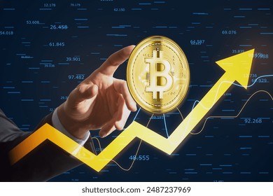 Close up of businessman hand pointing at golden bitcoin arrow and index on dark background. Cryptocurrency and financial growth concept