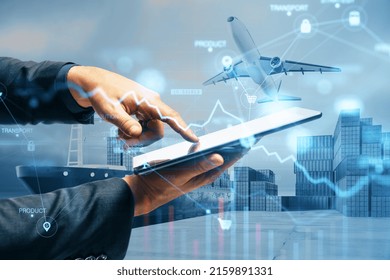 Close up of businessman hand pointing at tablet or smartphone with abstract glowing shipping hologram on dock with transport background. Export, logistics and freight concept. Double exposure - Powered by Shutterstock