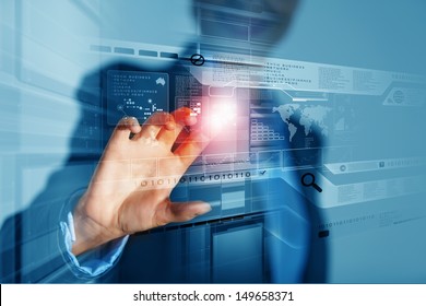 Close up of businessman hand pushing icon on media screen