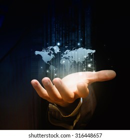 Close up of businessman hand showing digital planet