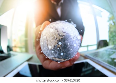 close up of businessman hand showing texture the world with digital social media network diagram concept Elements of this image furnished by NASA