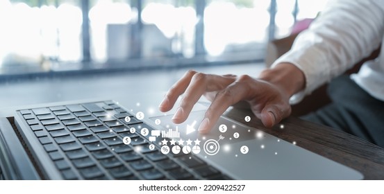 close up businessman hand touch screen on digital tablet to use marketing tool and check traffic research of pay per click program on web page for online b2b business and lifestyle concept - Shutterstock ID 2209422527