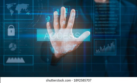 Close up businessman hand is touching interface computer monitor, fingerprint biometric identity and approval.  future security and password control 