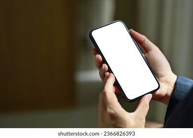 Close up businessman hands holding smartphone, blank screen for your application or website design project - Powered by Shutterstock