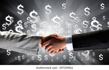 Close up of businessman hands making deal