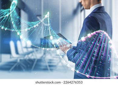 Close up of businessman hands using tablet with glowing binary code DNA helix on blurry office interior background. Human genome and innovative technologies concept. Double exposure