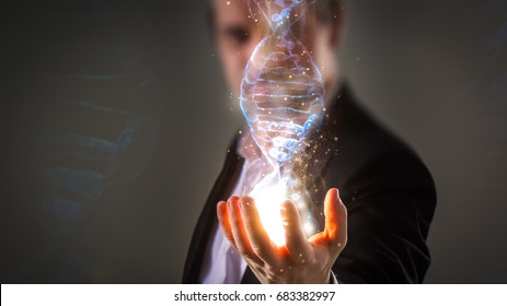 close up of Businessman holding glowing DNA helix with energy sparks - business, creation, genetics, future and science concept